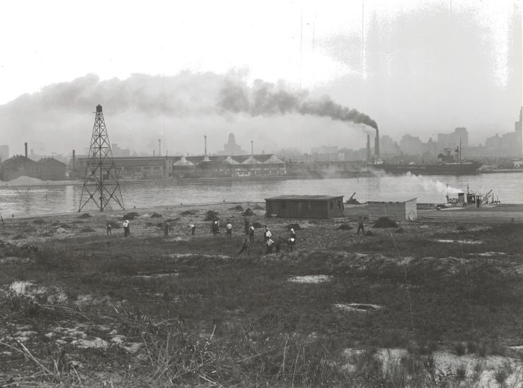 Work beginning on the site of the airport with city in background