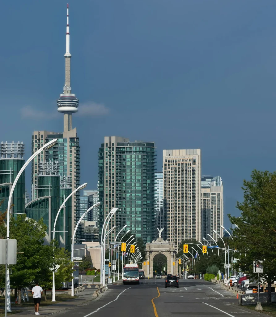 A Toronto city street in Exhibition place with the CN tower in the background.