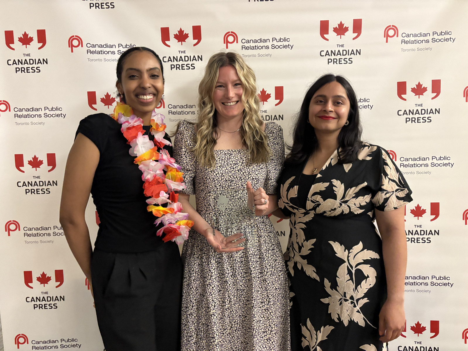 Three attendees at the Canadian Public Relations Society awards event.