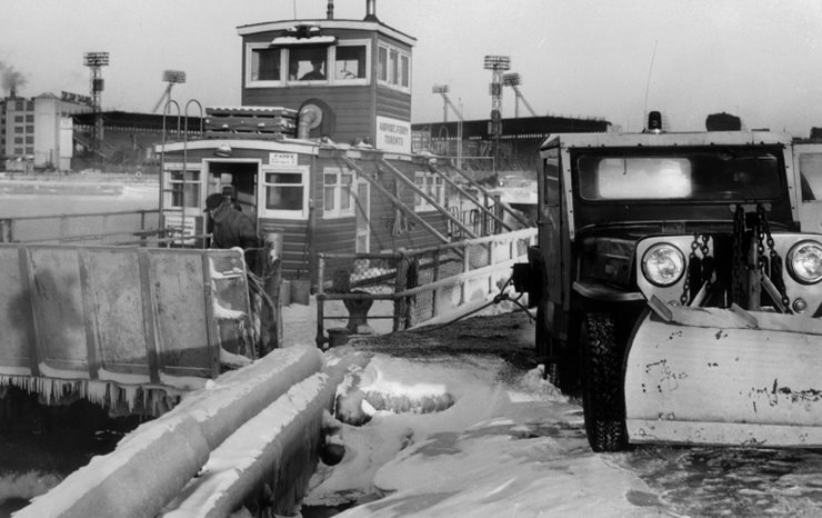 Tug boat at dock in winter