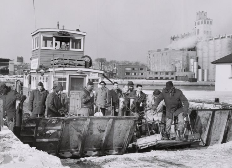 Ferry coming into port with 20 men on board