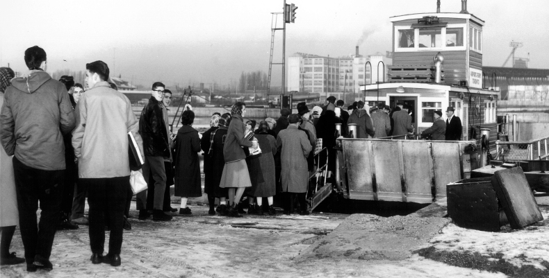 Travelers loading on to the ferry