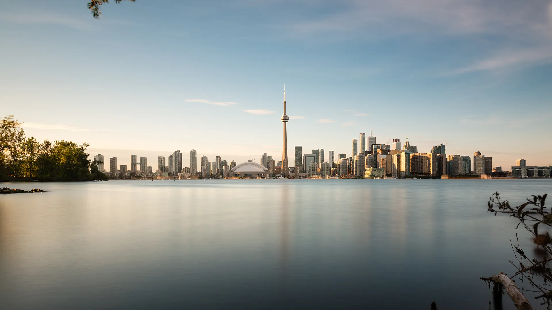 City of Toronto skyline photo taken from Toronto Island. Lake Ontario in the foreground
