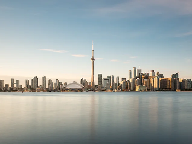 City of Toronto skyline photo taken from Toronto Island. Lake Ontario in the foreground