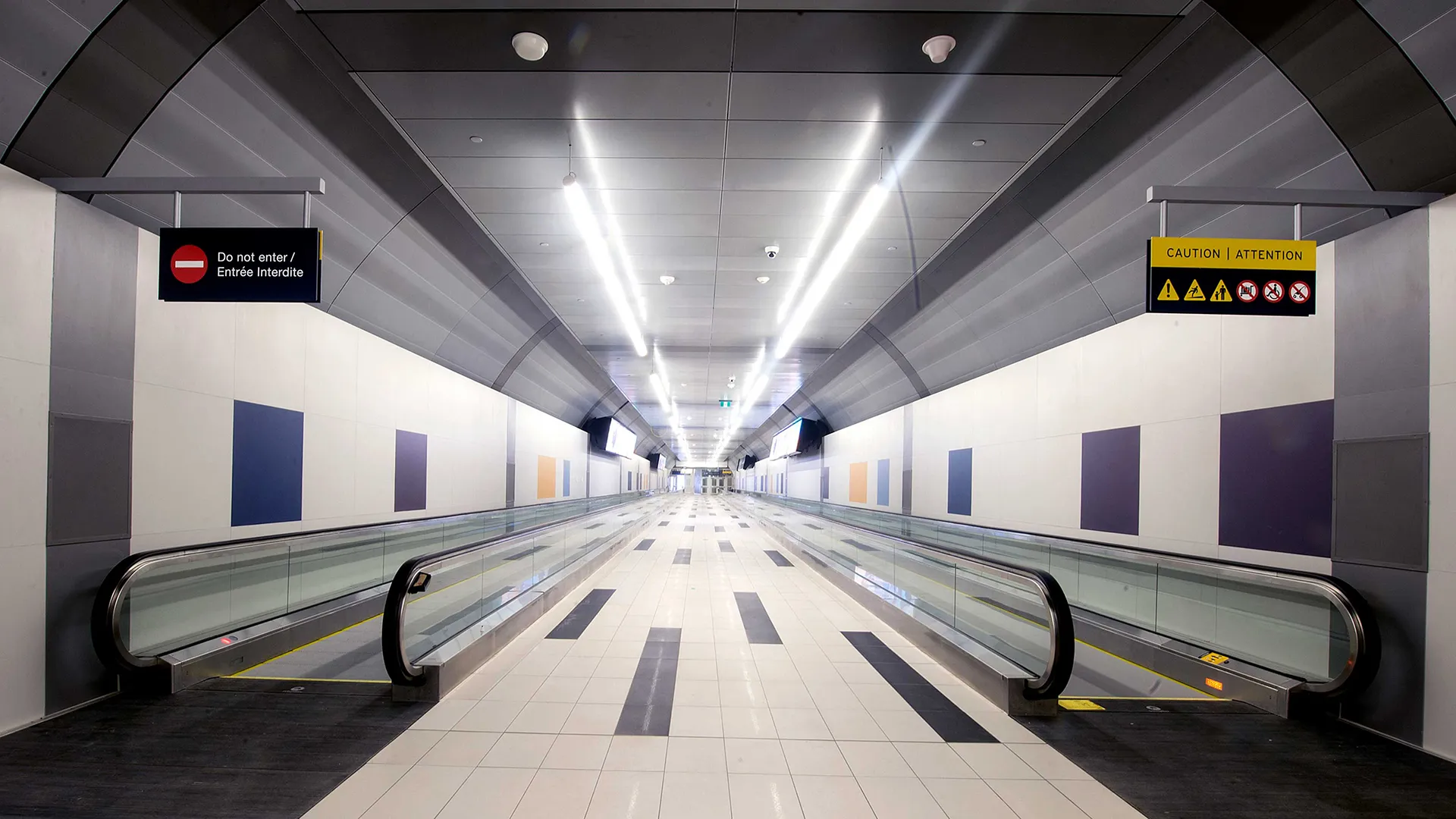 Pedestrian tunnel with movators