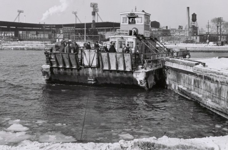 Ferry 20 feet away from dock on an icy day