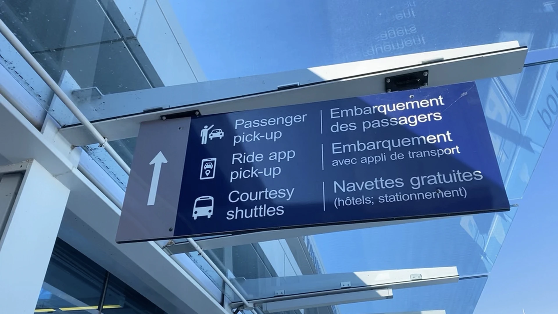 Sign at the airport for passenger pick-up, ride app pick-up and coutesy shuttles