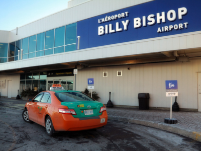 Toronto Billy Bishop Toronto City Airport with Beck Taxi waiting at the passenger drop off station