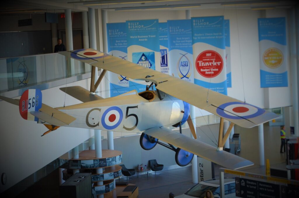 Nieuport 17 model plane hanging from ceiling