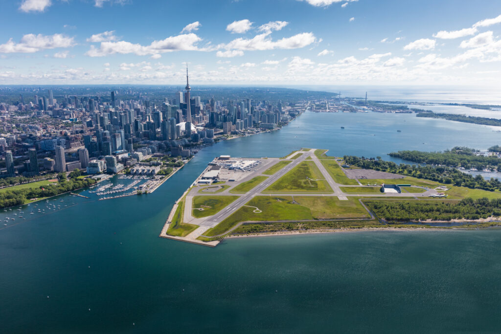 Aerial view of Billy Bishop Airport, the waterfront and downtown Toronto.