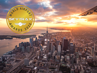 Skytrax World Airport Awards 2023 emblem over the Toronto skyline.