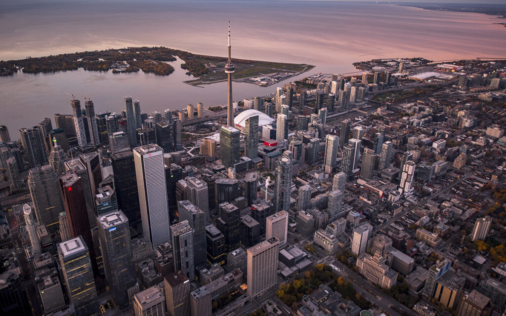 Aerial view of downtown Toronto and the island airport at sunset.