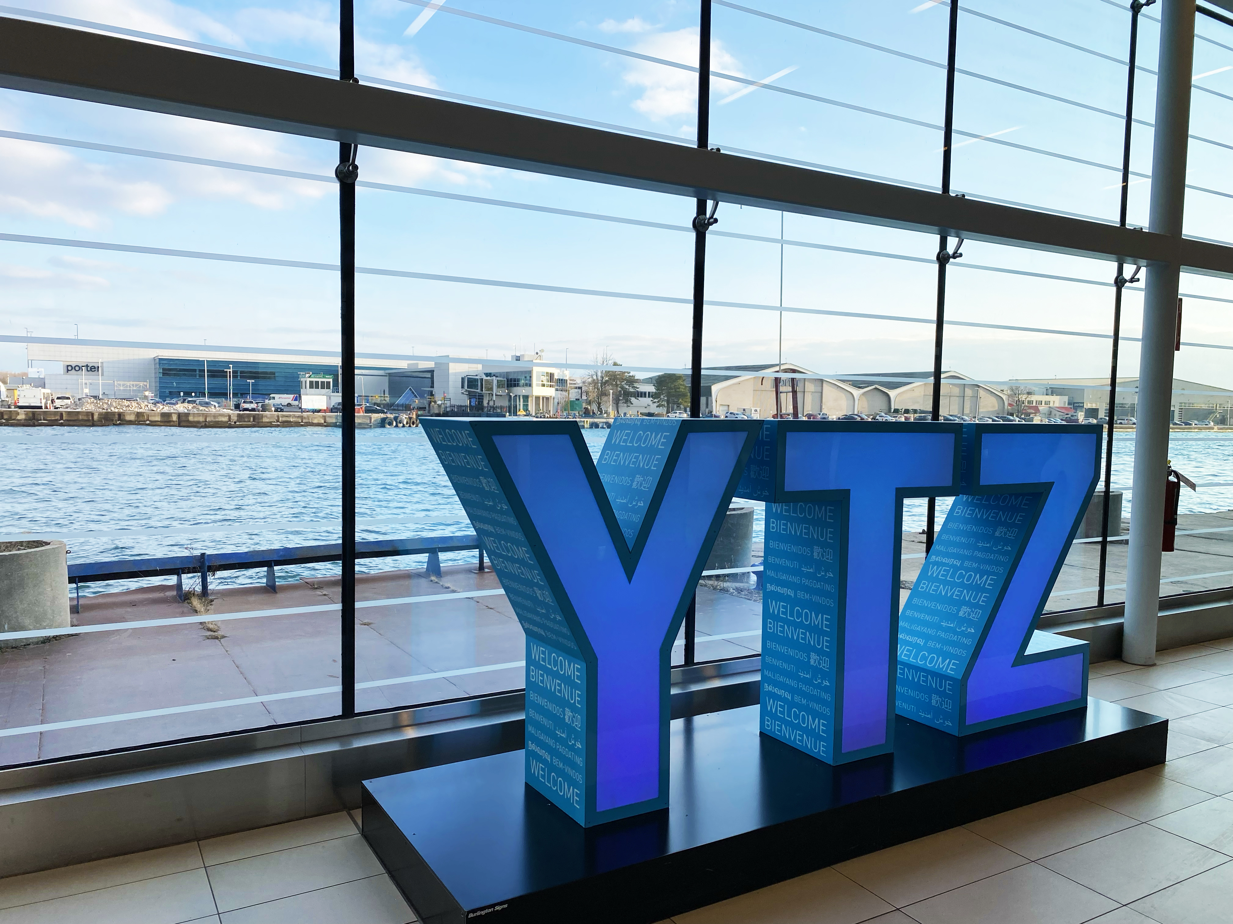 Large YTZ letters displayed inside the airport terminal.