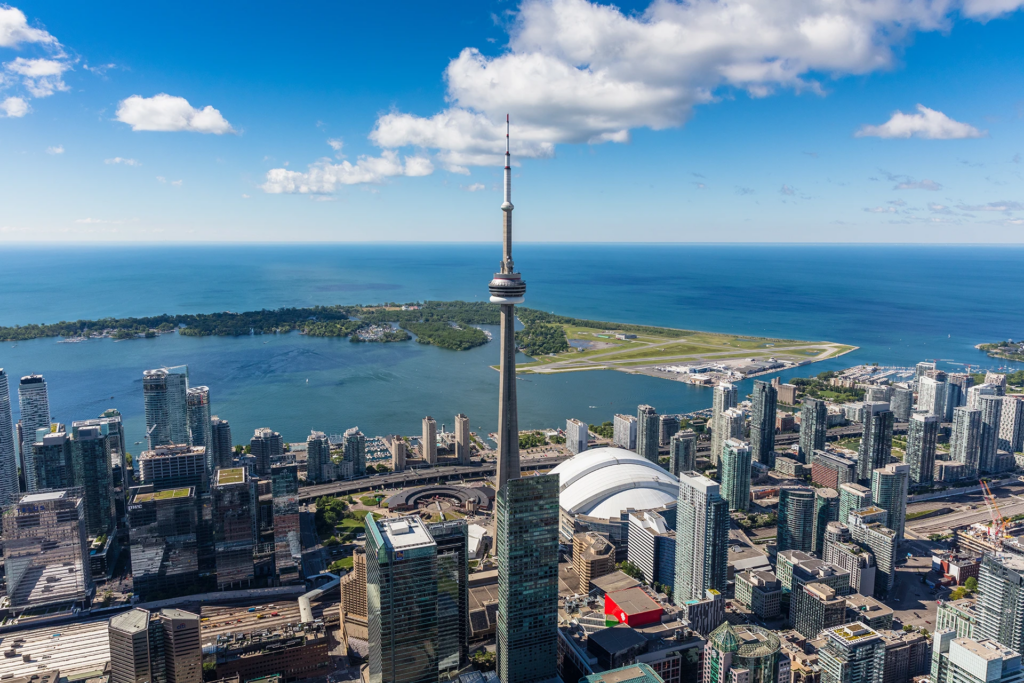 The CN Tower and downtown Toronto with Billy Bishop Airport across the harbour.